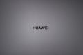 Gray Huawei laptop top view close up