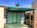 Social area, barbecue under shade netting.