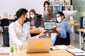 Social distance office with business team wear face mask as new normal life Royalty Free Stock Photo