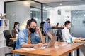 Social distance office with business team wear face mask as new normal life Royalty Free Stock Photo