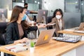 Social distance office with business team wear face mask as new normal life Royalty Free Stock Photo