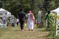 Social distance practiced as couple walks towards admission tent at the Sussex County Sunflower Maze