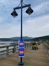 Social distance signs for Covid 19 at the Pier of Rocky Point Park in Port Moody, October 1st 2020