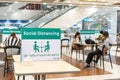 Social distancing for COVID-19 disease pandemic prevention in Tesco Lotus food court dining table public area