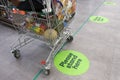 Social distancing marks on supermarket floor intended to stop or slow down the spread of a contagious Coronavirus COVID-19 Royalty Free Stock Photo