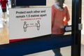 Social distancing sign outisde a mall Royalty Free Stock Photo