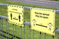 Social distancing sign at school playground road crossing