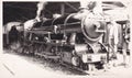 Vintage black and white photo of a miniature steam locomotive 1950s