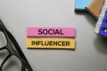 Social Influencer text on sticky notes isolated on office desk