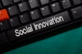 Social Innovation isolated on laptop keyboard background