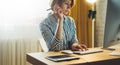 Social isolation girl working at home with monitor computer, manager typing on keyboard, work process concept indoors workplace Royalty Free Stock Photo