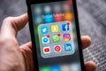 Social media app icons displayed on Apple iPhone