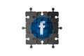 Social Media Facebook Icon on Puzzle Pieces Royalty Free Stock Photo