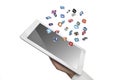 Social media icons fly off the ipad in hand Royalty Free Stock Photo