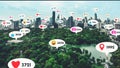 Social media icons fly over city downtown showing people reciprocity connection