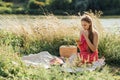 Social media internet addiction, phubbing. Young woman reading social media on their smart phones outdoor summer day Royalty Free Stock Photo