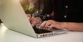 Social media and Marketing virtual icons screen of business women typing keyboard with laptop computer. Royalty Free Stock Photo