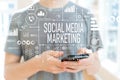 Social media marketing with man using a smartphone Royalty Free Stock Photo