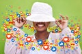 Social media, smile and emoji icon of woman influencer for like or love reaction. Person hiding under hat for fan page