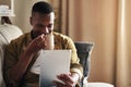 Social media is too interesting today. Cropped shot of a handsome young man drinking coffee while using a digital tablet Royalty Free Stock Photo