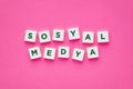 Social media written with letters on pink background Royalty Free Stock Photo