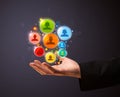 Social network icons in the hand of a businessman