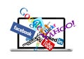 Social network logos on laptop