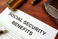 Social security benefits form and glasses. Royalty Free Stock Photo