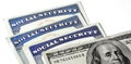 Social Security Cards Representing Finances and Retirement with Money Royalty Free Stock Photo