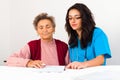 Social Service Provider Helping Elderly Royalty Free Stock Photo