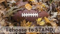 I choose to stand for the national anthem before a football game Royalty Free Stock Photo