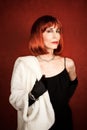 Socialite with brassy red hair Royalty Free Stock Photo