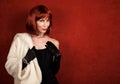 Socialite with brassy red hair Royalty Free Stock Photo