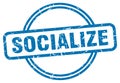 socialize stamp. socialize round grunge sign.