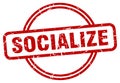 socialize stamp. socialize round grunge sign.