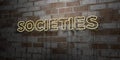 SOCIETIES - Glowing Neon Sign on stonework wall - 3D rendered royalty free stock illustration