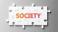 Society complex like a puzzle - pictured as word Society on a puzzle pieces to show that Society can be difficult and needs