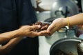 The Society of Sharing Food to Homeless and the Poorest: The Concept of Feeding : The hands of the rich give food to the hands of