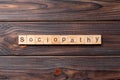 Sociopathy word written on wood block. sociopathy text on table, concept