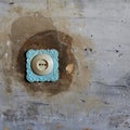 Socket on the background of a concrete wall Royalty Free Stock Photo