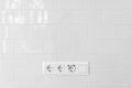Socket, electric plug on white tiles in kitchen. USB socket for smartphone Royalty Free Stock Photo