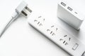 Socket plug electric power bar and white silver power bank isolate. save energy and reduce energy efficiency concept Royalty Free Stock Photo