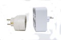 Sockets-splitters for two and four white plugs Royalty Free Stock Photo