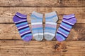 Socks on wooden background. color socks short women`s under shoes