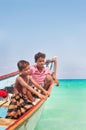 Socotra, Yemen, March 9, 2015 Simple rural Children fishermen in a fishing boat on the sea. island of Socotra. Yemen. Royalty Free Stock Photo