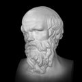 Socrates. Ancient marble statue head of the greek philosopher. Man bust with beard  on black background Royalty Free Stock Photo