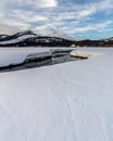 Soda Creek Meanders through a Snow Covered Meadow in Deschutes N