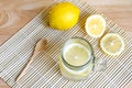 Soda with lemon in jar on wooden table - lemon soda Royalty Free Stock Photo