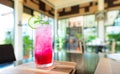 Soda Red sparkling water with ice in a glass on table,lunch time Royalty Free Stock Photo