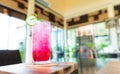 Soda Red sparkling water with ice in a glass on table,lunch time Royalty Free Stock Photo